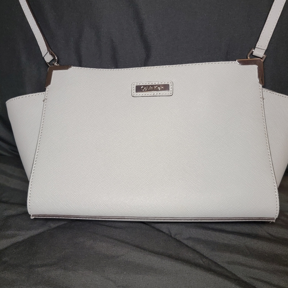 Calvin Klein grey medium hardshell crossbody trapeze style purse